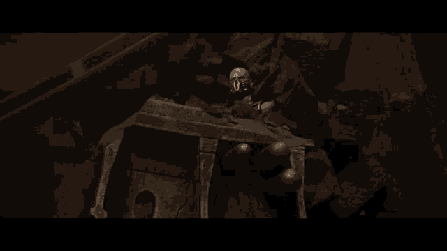 a man in armor with a mask on his face is standing in a dark room