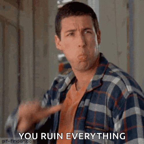 a man in a plaid shirt is making a funny face and says `` you ruin everything '' .