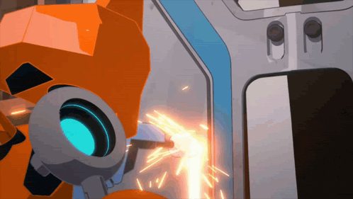 a robot with a blue light on its head is cutting something