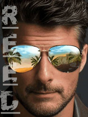a man wearing a pair of sunglasses with a reflection of a beach and palm trees
