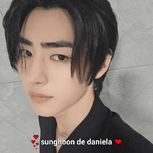 a close up of a person 's face with the name sunghoon de daniela written below it