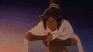 a woman in a white cape holds her hands together in front of her face