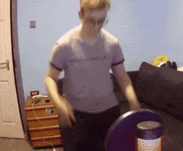 a man wearing a t-shirt that says ' i love you ' on it is dancing