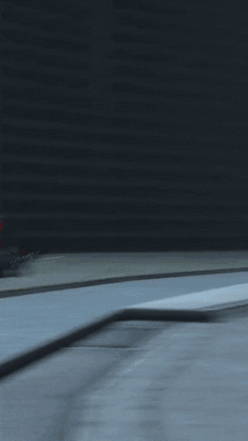 a car is driving down a road with the sun shining brightly in the background
