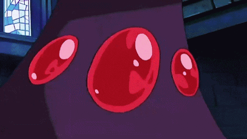 a cartoon character has a purple necklace with a red stone on it