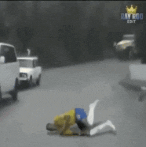 a man is laying on the ground in front of a truck with ray rod edit written on the bottom