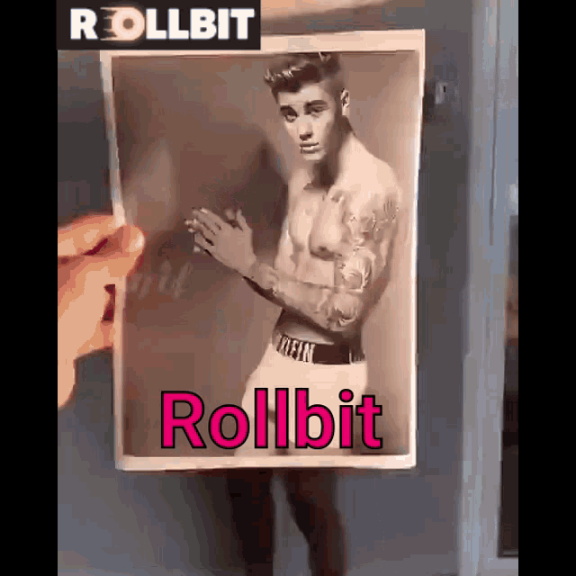 a person is holding a picture of justin bieber in underwear