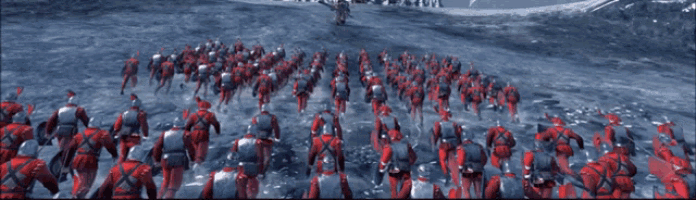 a large group of red soldiers are standing in a snowy field