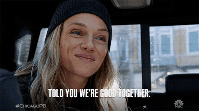 a woman sitting in a car with the words told you we 're good together