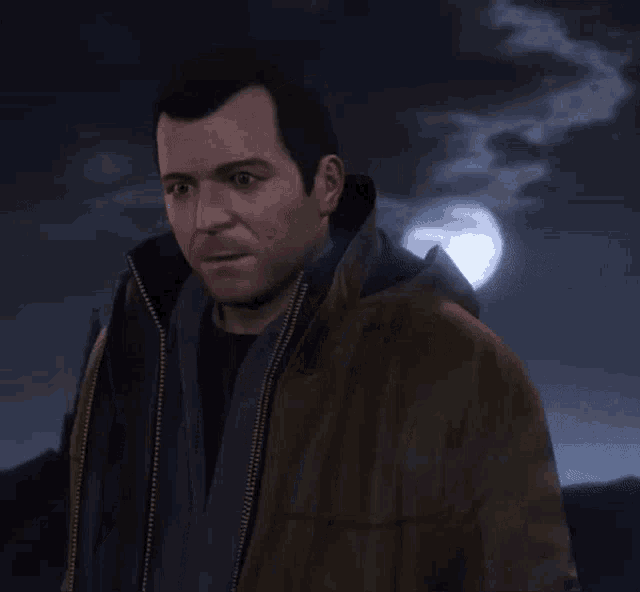 a man standing in front of a full moon