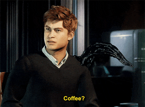 a man standing next to a coffee pot that says " coffee "