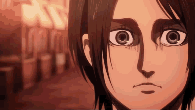a close up of a person 's face with a large eye .