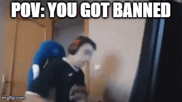 a man sitting in a chair with the words pov : you got banned