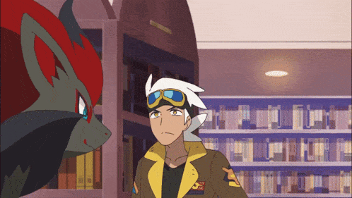 a man in a brown jacket with the letter s on it stands next to a pokemon
