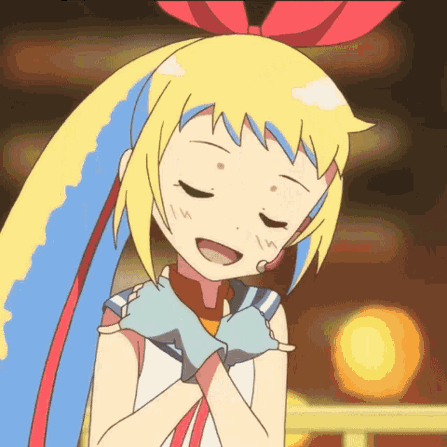 a cartoon girl with yellow hair and blue and red hair has her eyes closed and her hands folded