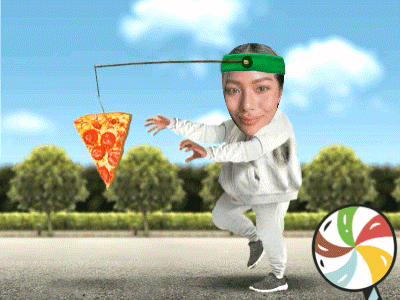 a woman wearing a green headband is running with a slice of pizza in her hand