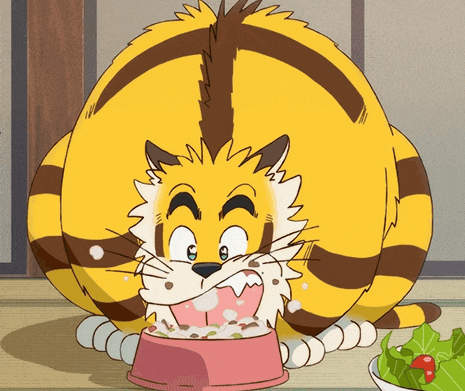 a cartoon cat is eating food from a bowl