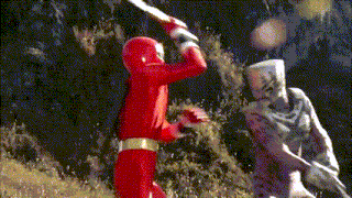 a man in a red superhero costume is holding a sword