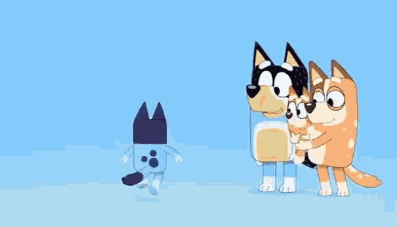 a group of cartoon dogs are standing next to each other and hugging each other .