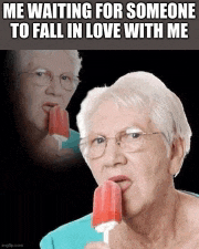an elderly woman is eating a popsicle and waiting for someone to fall in love with her