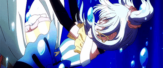 a girl with white hair is swimming in the water