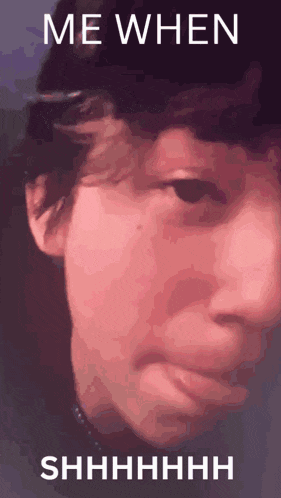 a close up of a person 's face with the words me when shhhh written below it