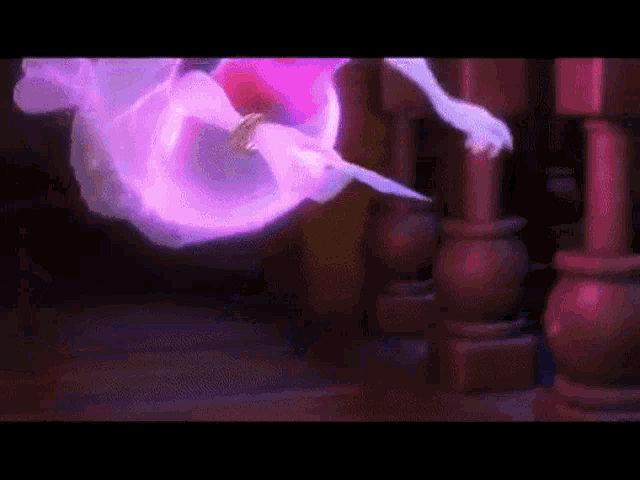 a ghost is flying through the air in a dark room with a purple light coming out of it .