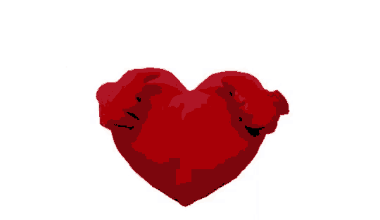 a red heart shaped pillow with arms reaching out