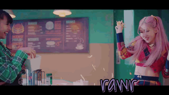 a woman with pink hair is standing in front of a menu that says nuggets on it