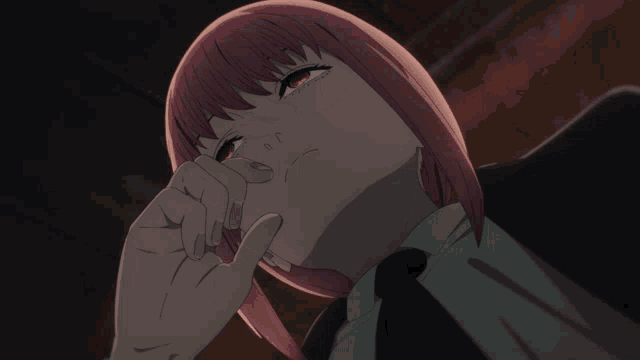 a girl with pink hair and red eyes is looking up