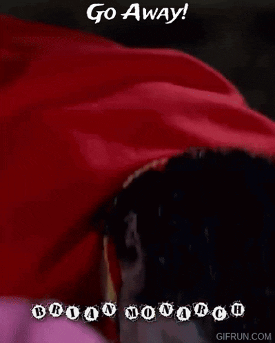 a man in a red cape is laying down with the words go away written above him .