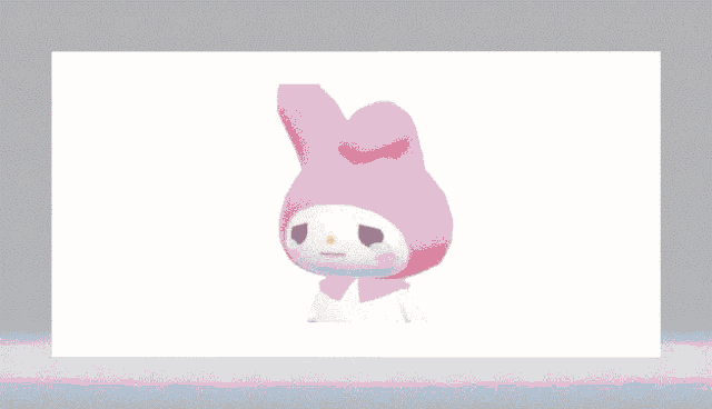 a pink bunny with a sad look on its face