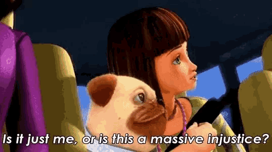 a girl is sitting in the back seat of a car with a pug dog and talking to it .