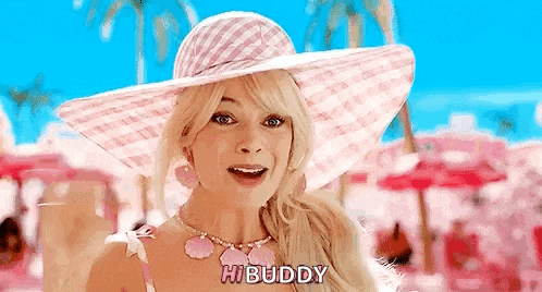 a woman is wearing a pink hat and a pink necklace and says hi buddy .