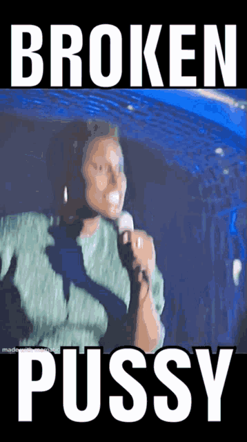 a woman singing into a microphone with the words " broken pussy " on the bottom