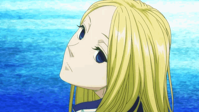 a girl with long blonde hair and blue eyes is looking up at the sky