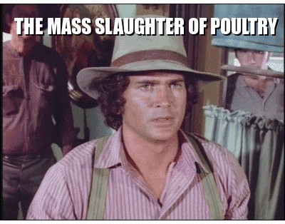 a man wearing a hat with the words the mass slaughter of poultry
