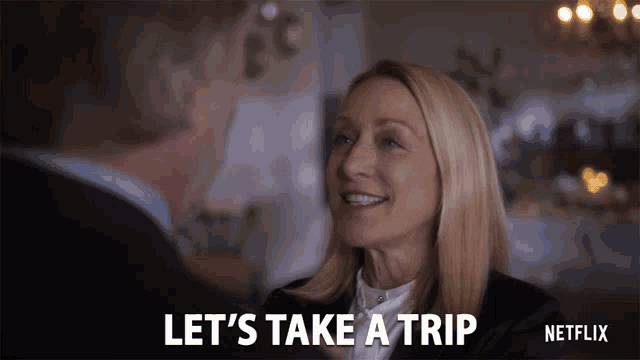 a woman says let 's take a trip while talking to a man