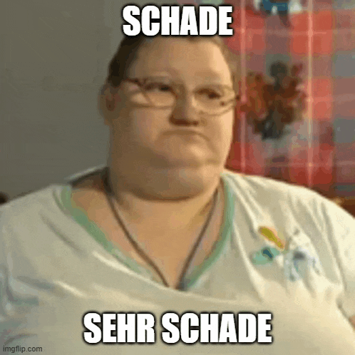 a woman wearing glasses and a white shirt is making a funny face with a meme .