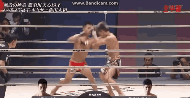two men are fighting in a boxing ring with the website www.bandicam.com visible
