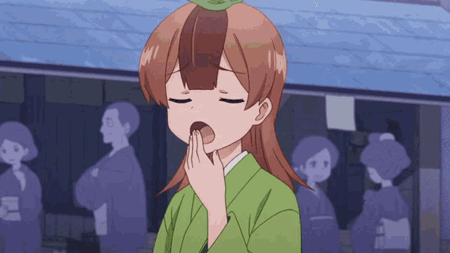 a girl in a green kimono is yawning with her eyes closed