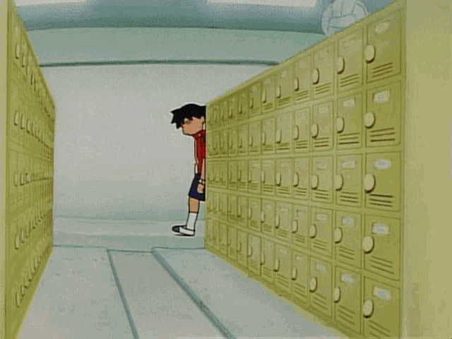 a girl in a red shirt and blue shorts is walking through a hallway filled with lockers