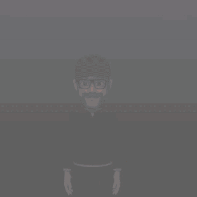 a man with glasses and a hat is standing in front of a spotlight