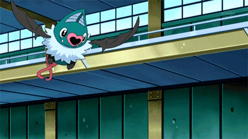 a cartoon character is flying over a building with tv tokyo on the bottom