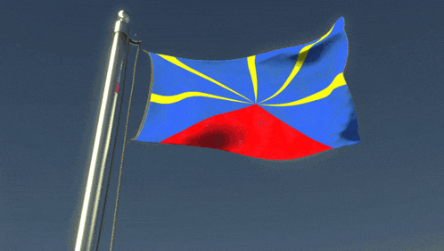 a blue yellow and red flag is waving in the wind against a blue sky
