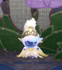 a cartoon character with a crown on his head is sitting on a rock .