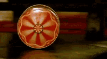 a red and white circle with a circle in the center