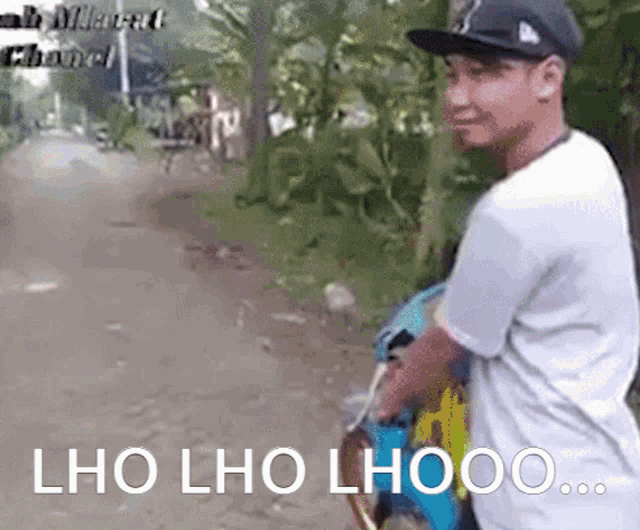 a man standing on a dirt road with the words " lho lho lhooo " written on the bottom