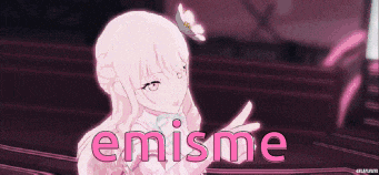 a girl with a flower in her hair is standing in front of a sign that says " emisme "