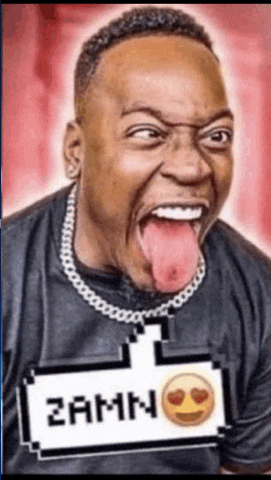 a man is sticking his tongue out and wearing a shirt that says zamn on it